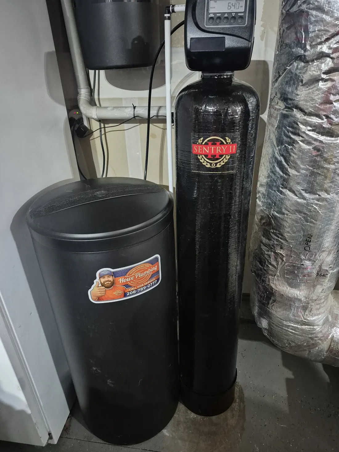 Sentry II water softener and brine tank installed by Howe Plumbing