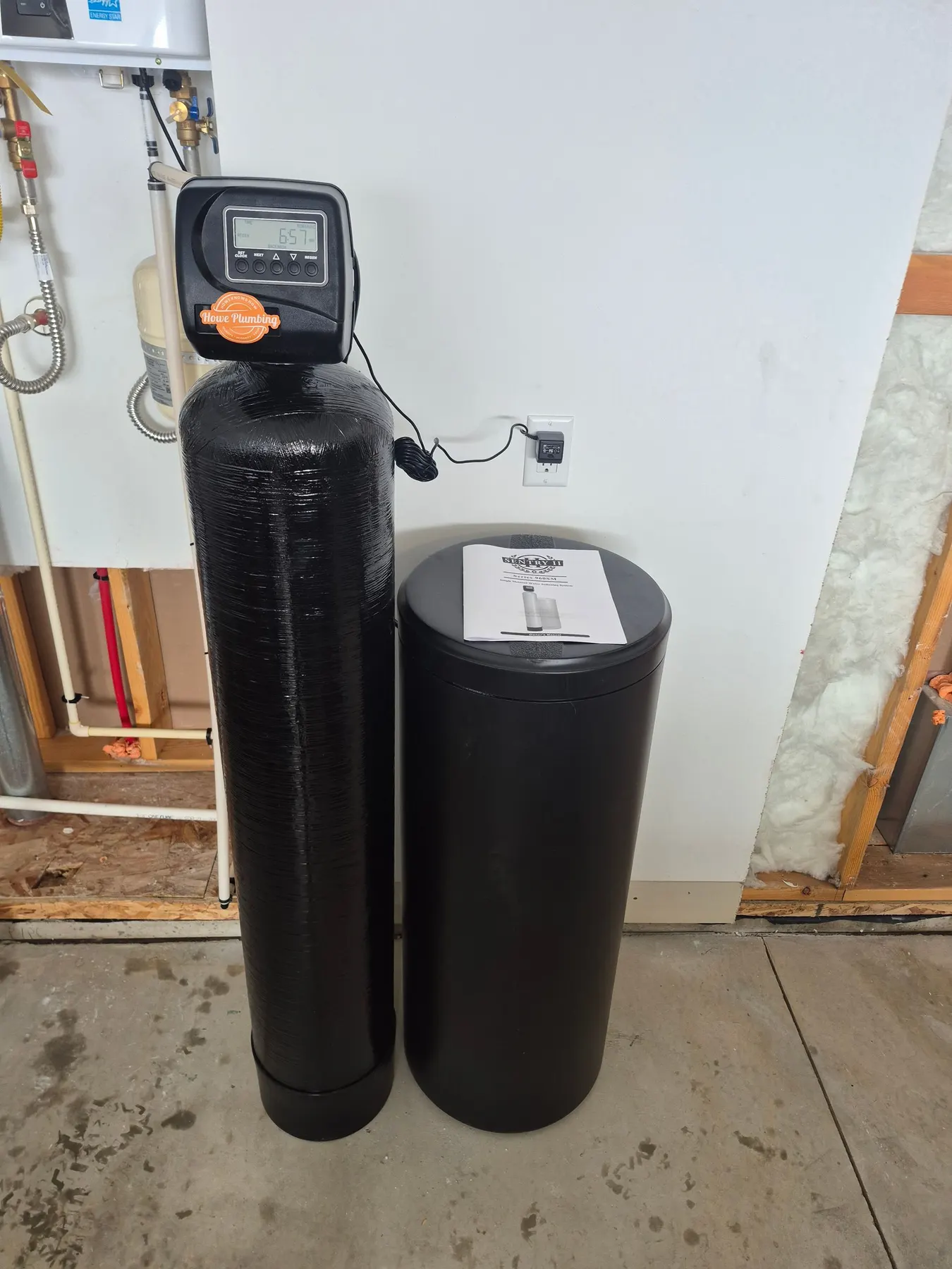 Water softener resin tank and brine tank installed by Howe Plumbing